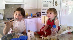 Two of the grandgirls, Elektra & Unity, baking cupcakes at Nana’s